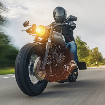 Motorcycle driving down the road